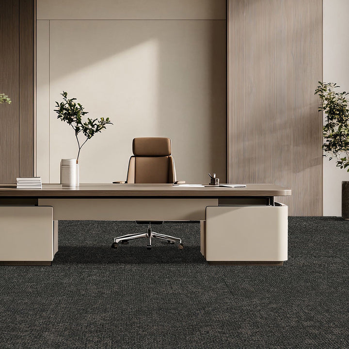 Modern office desk with chair and side cabinets in a minimalistic office setting.