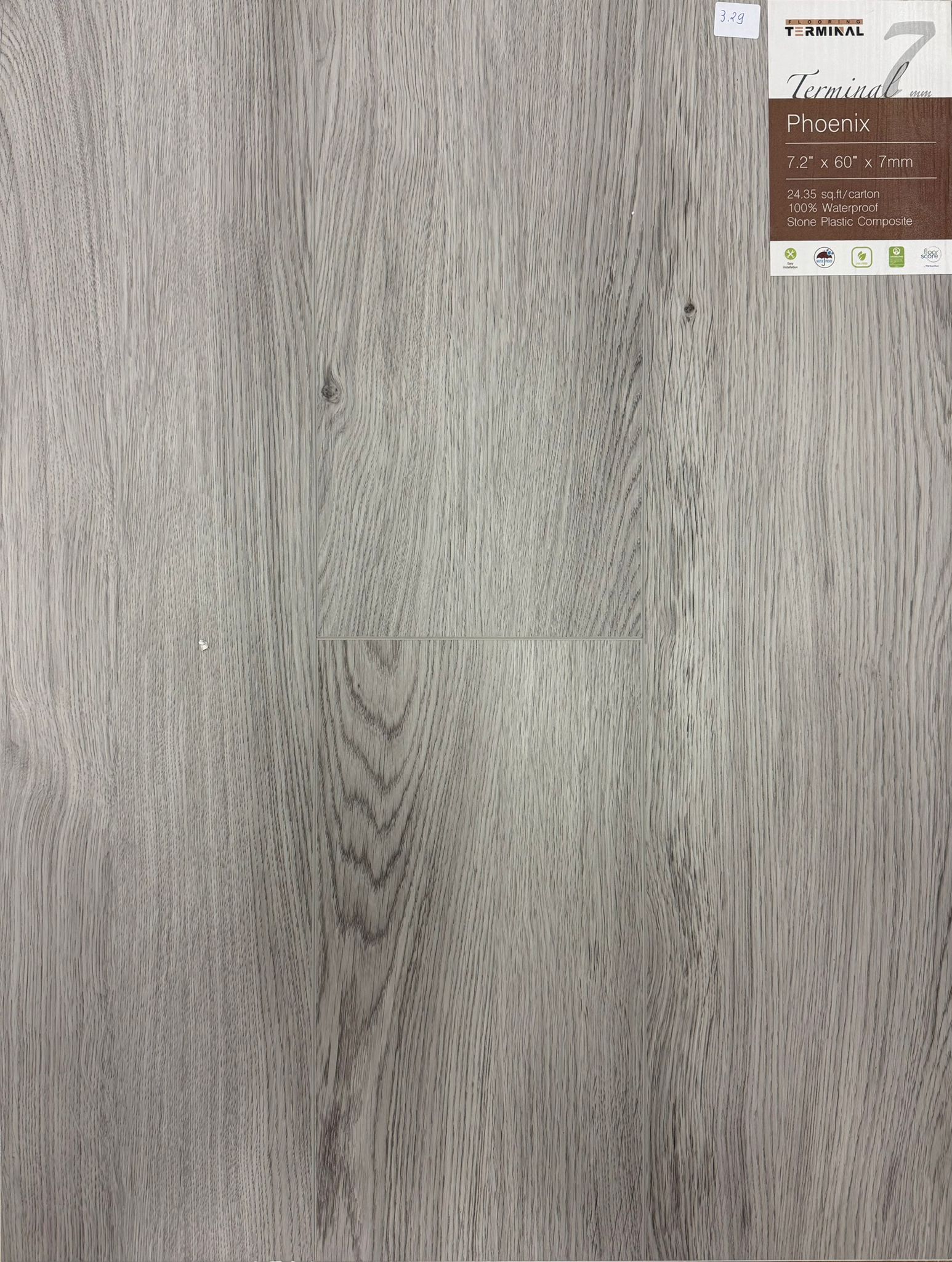 Gray wood-patterned flooring with a label on the top right corner.