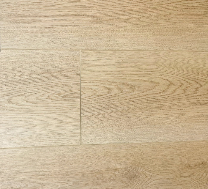 Close-up of light wood flooring with visible grain and texture