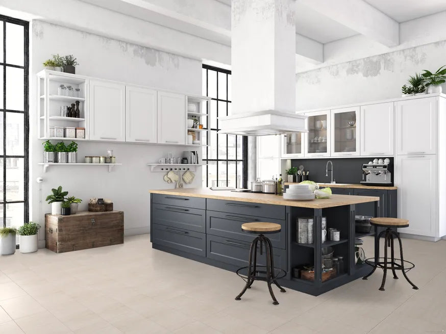 Modern kitchen with white cabinets, a black island, and wooden countertops.