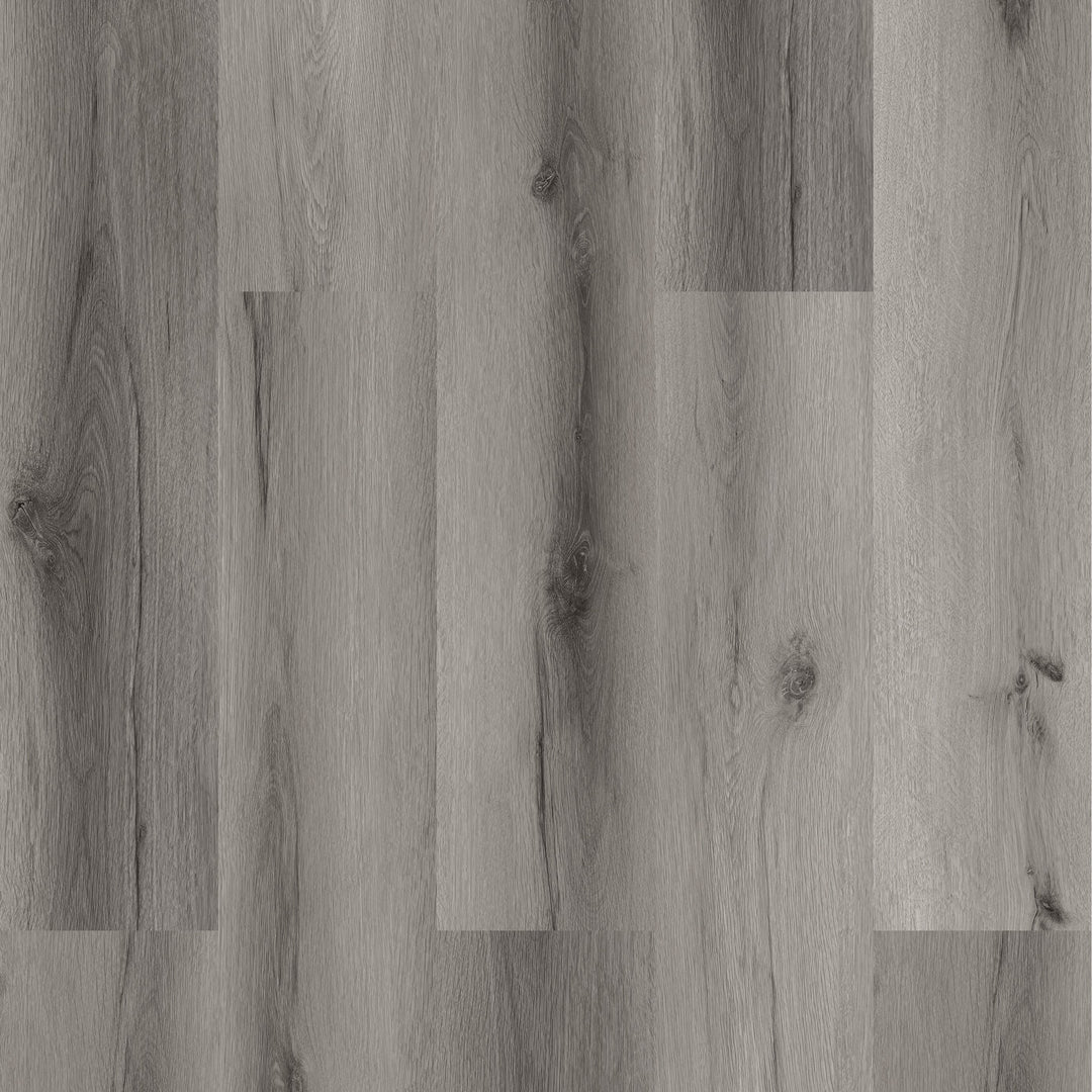 Close-up of a wooden floor with a grayish-brown color.