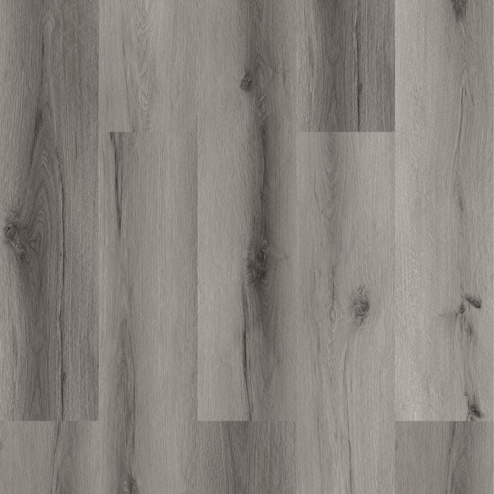 Close-up of a wooden floor with a grayish-brown color.