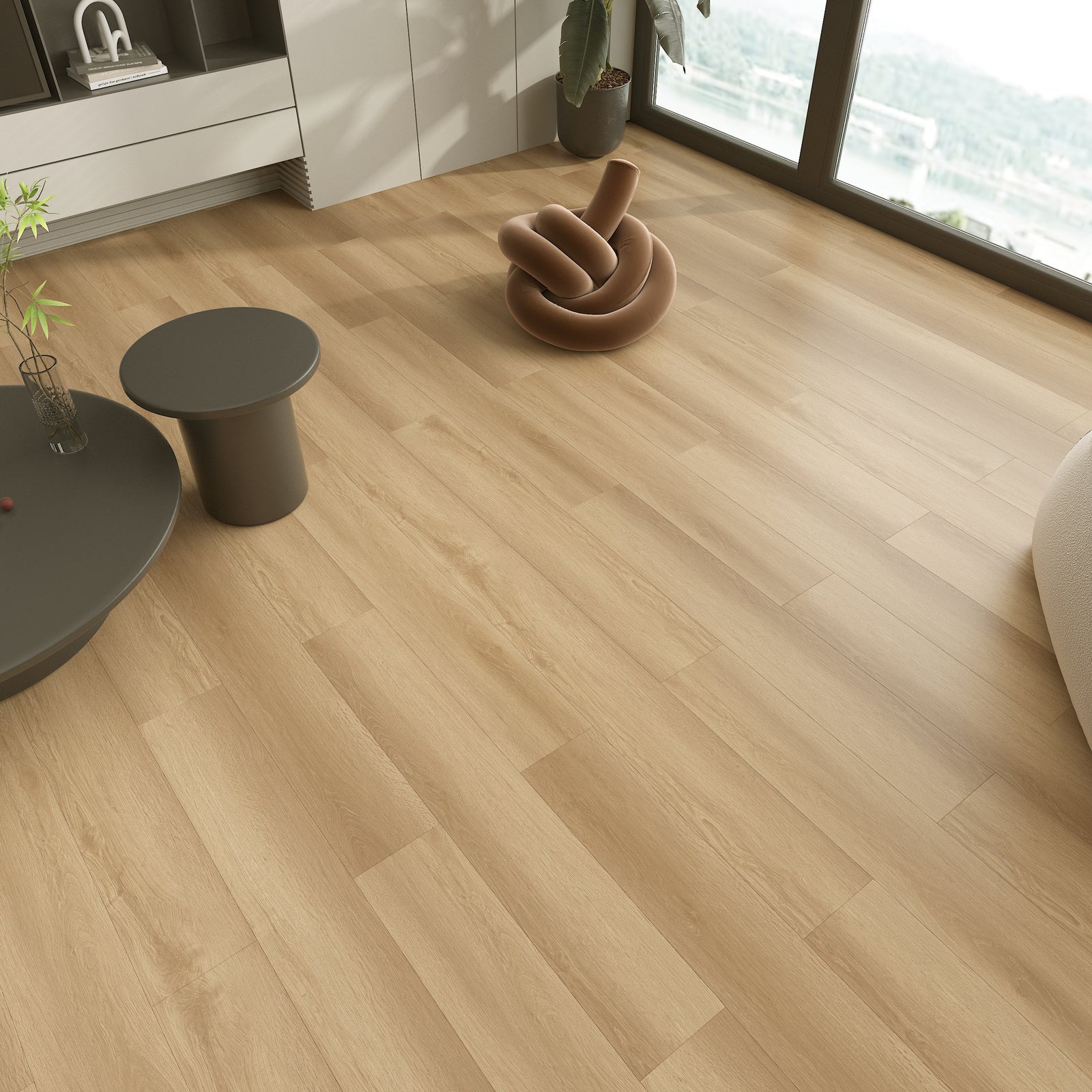 Wooden floor with modern furniture and decor in a room with large windows.