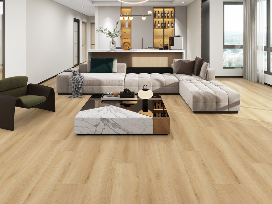 Modern living room with a sectional sofa, coffee table, and decorative items.