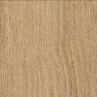 Close-up of a wooden surface with a light brown color and visible grain pattern.
