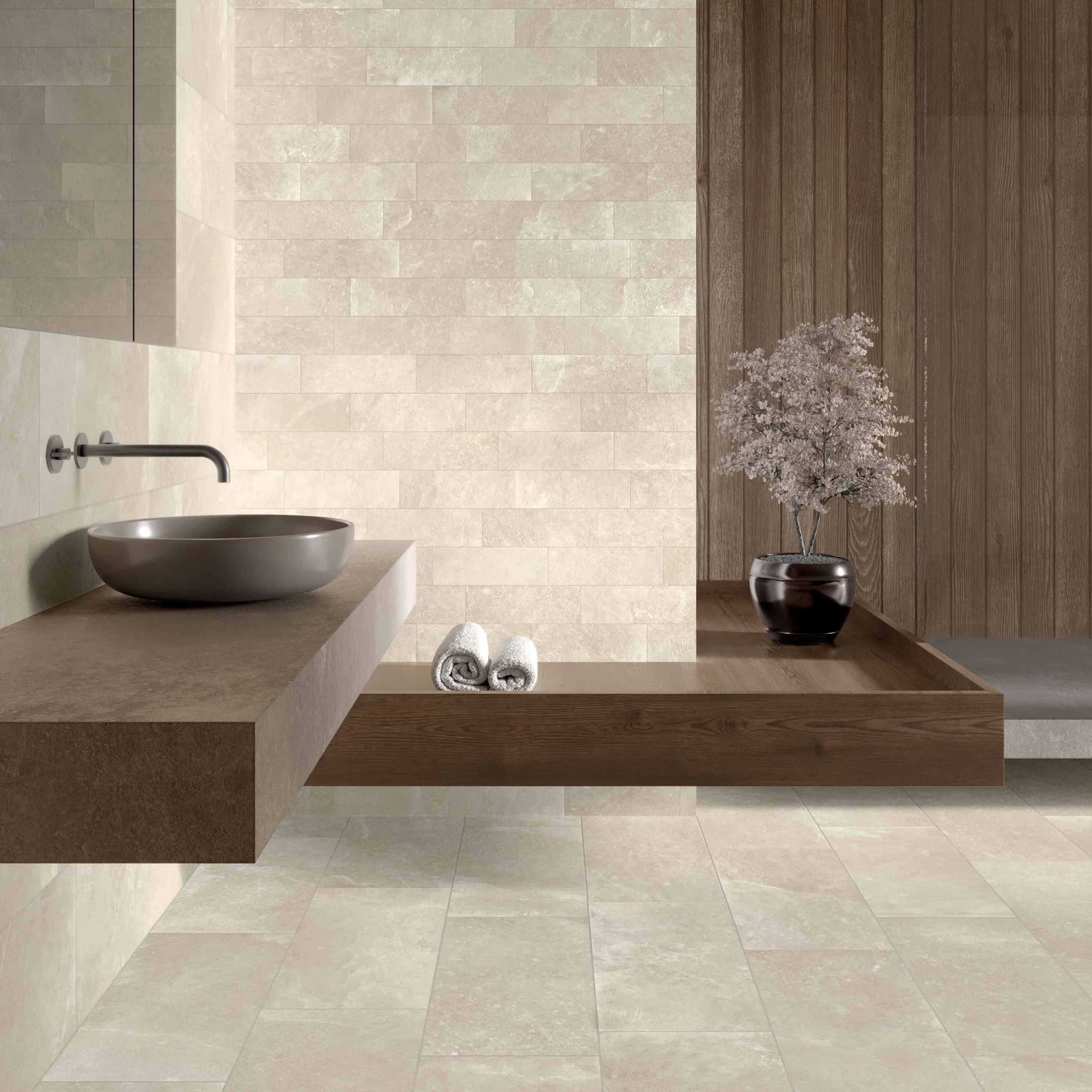 Bathroom interior with tiled walls and floor, featuring a sink and decorative elements.