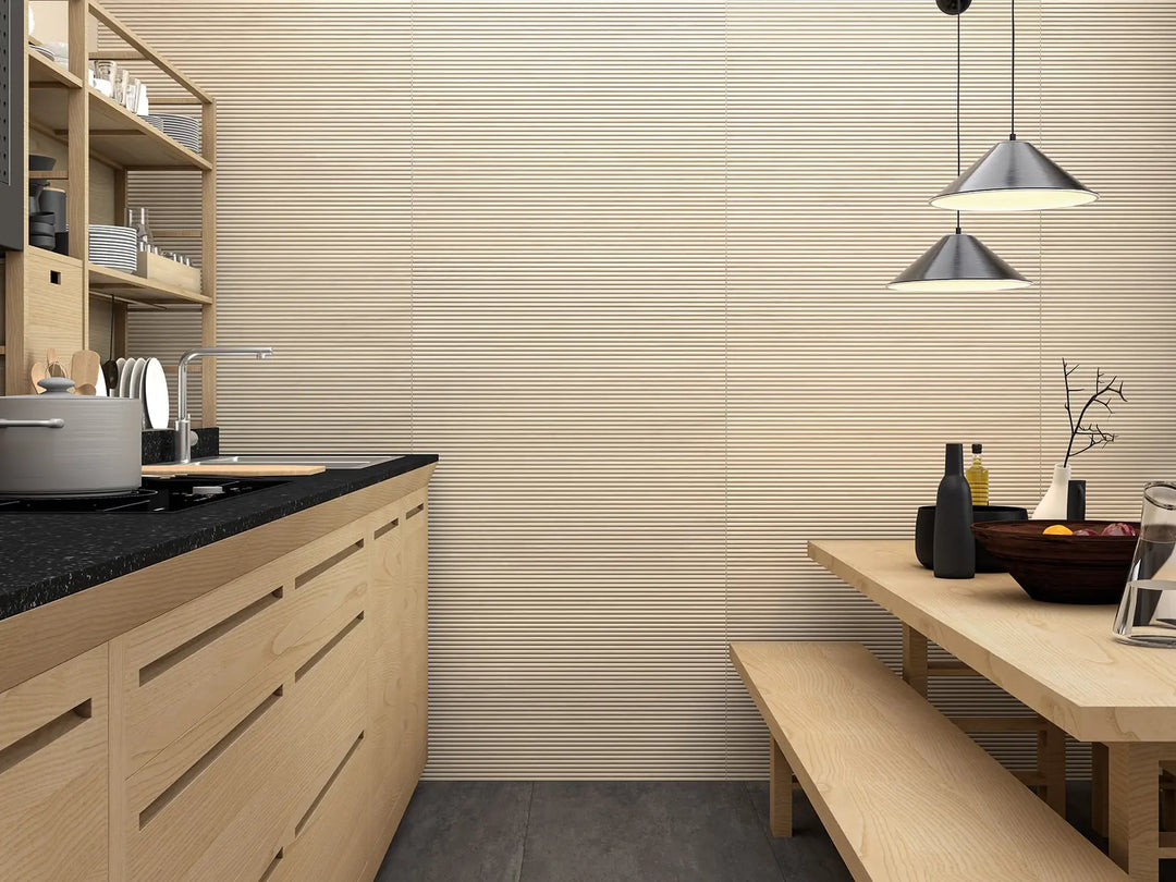 Modern kitchen with wooden cabinets, black countertop, and dining table.