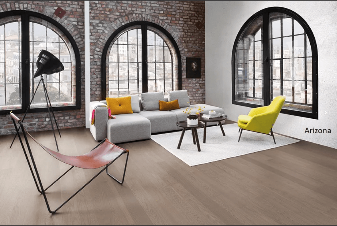 A modern room which displays the beautiful look of Arizona BOEN premium engineered hardwood flooring from Canadian Standard.