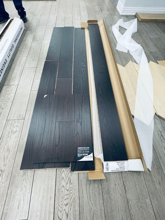 Planks of Black Brown VIDAR premium American Oak engineered hardwood flooring.