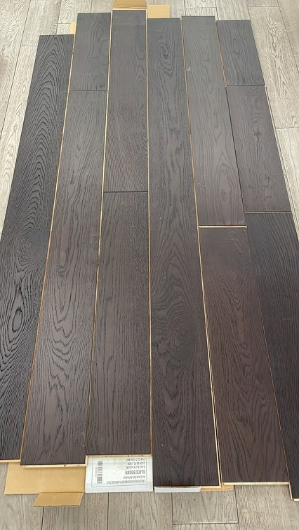 Planks of Black Brown VIDAR premium American Oak engineered hardwood flooring.