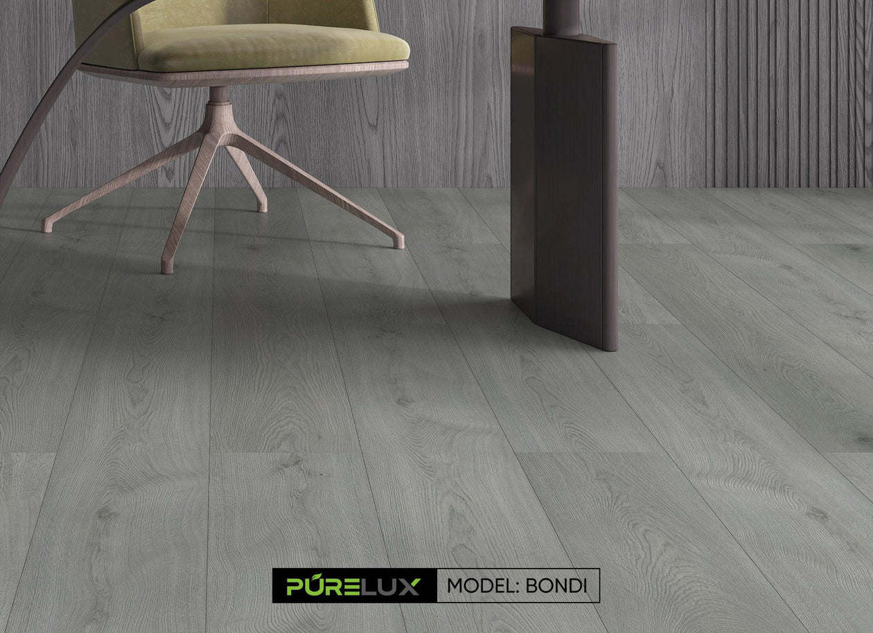 A bright and inviting office showcasing the sleek, medium gray tones of Purelux vinyl plank flooring.