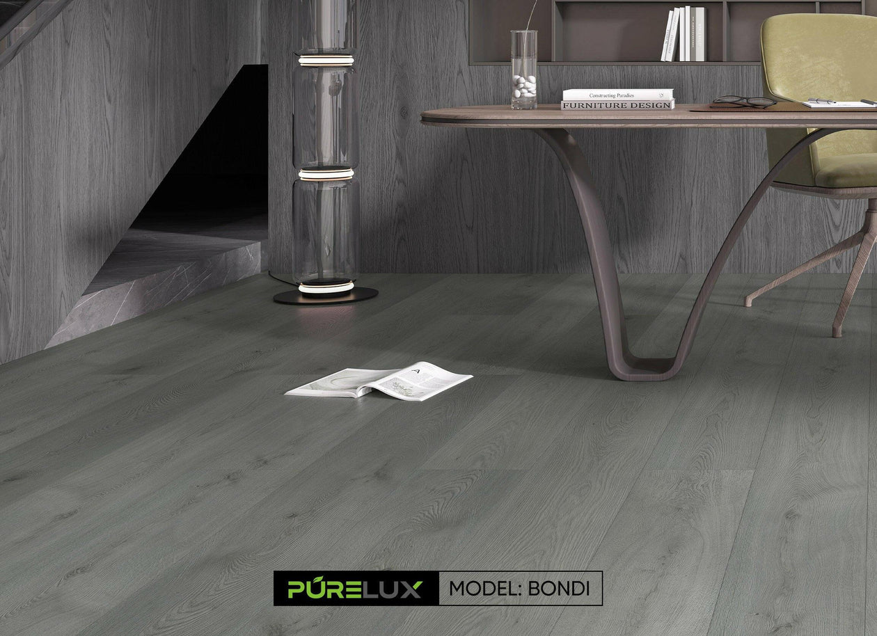 A bright and inviting office showcasing the sleek, medium gray tones of Purelux vinyl plank flooring.