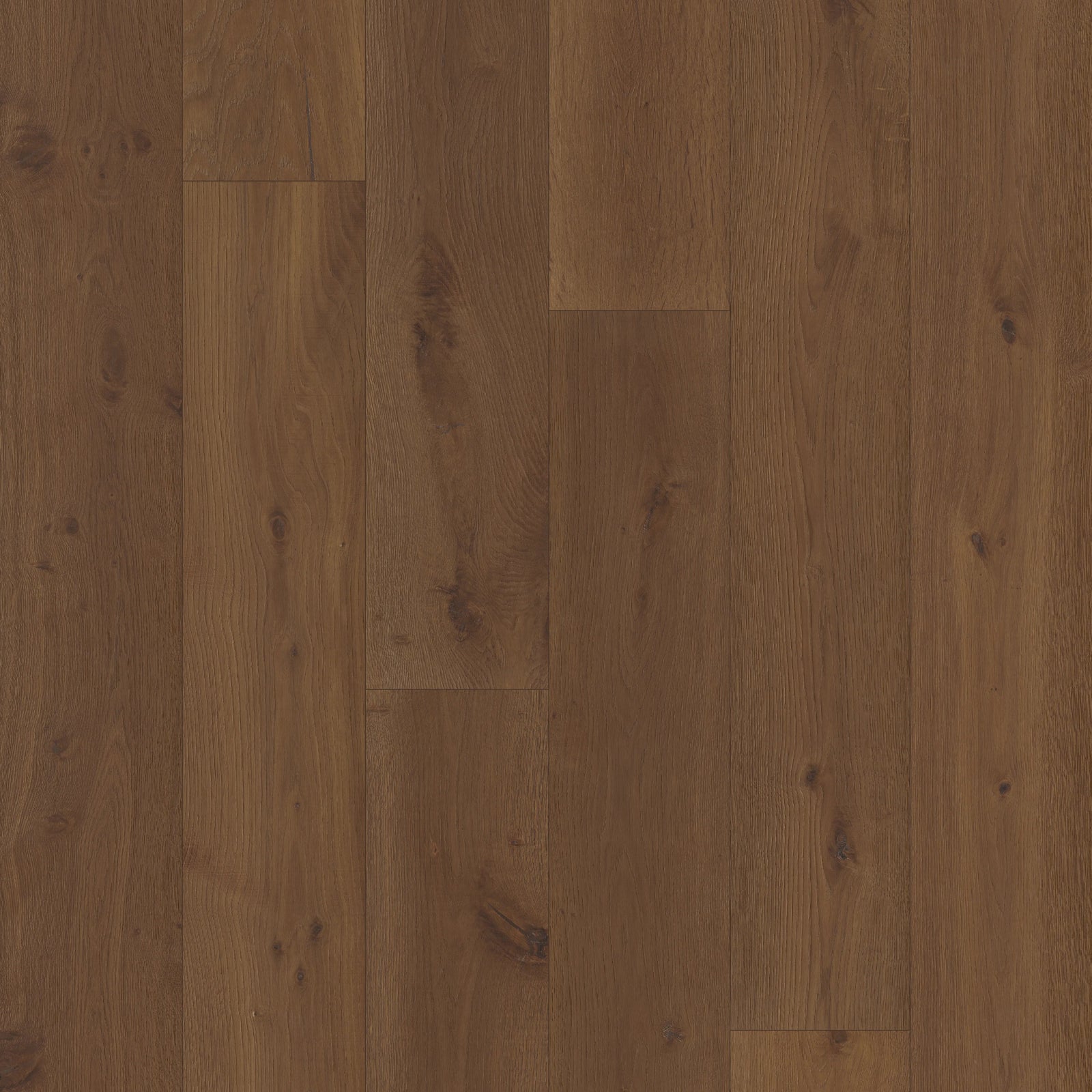 Close up of Bramblewood by Fuzion TruNorth engineered hardwood flooring featuring wide planks and a durable 3mm top layer. 