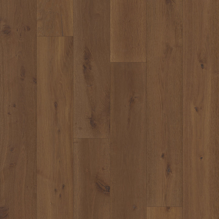 Close up of Bramblewood by Fuzion TruNorth engineered hardwood flooring featuring wide planks and a durable 3mm top layer. 