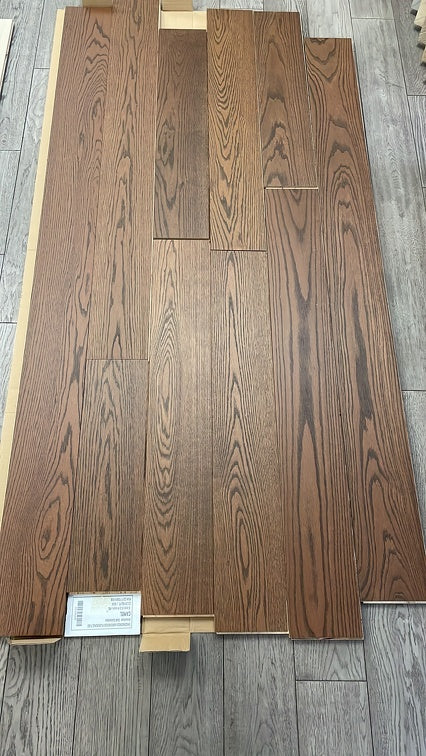 Planks of Camel VIDAR premium American Oak engineered hardwood flooring.