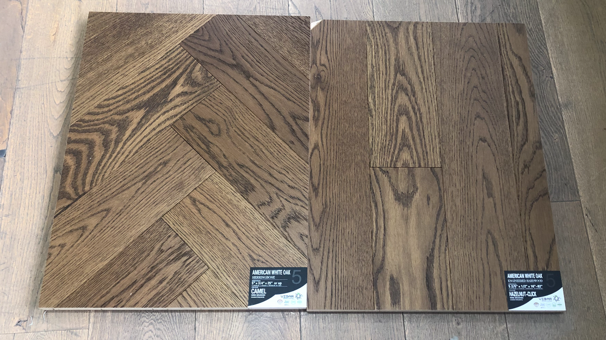 A close up of Camel VIDAR premium 5” American white oak engineered hardwood flooring in herringbone.