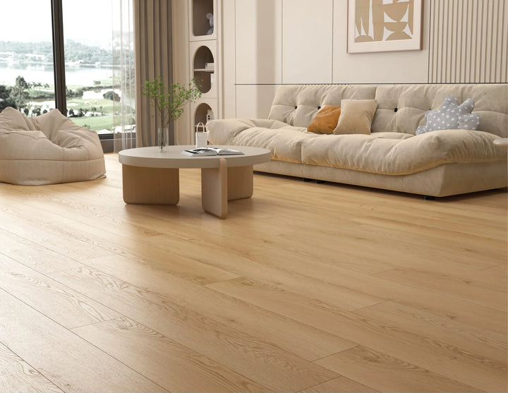 Canadian Standard Akita waterproof laminate flooring installed in a modern living room — natural oak wood texture laminate with professional installation available in Waterloo and Kitchener, Canada-wide delivery.