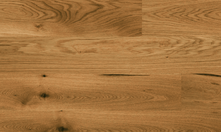 Close-up of Canyon 6" x 9/16" engineered European oak hardwood flooring from Outer Banks Clic collection, 2.5mm veneer layer, and Light wire-brushed texture. Available at Advanced Flooring Waterloo.