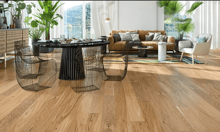Canyon engineered European oak hardwood flooring from Outer Banks Clic collection installed in a modern room, featuring wide 6" x 9/16" planks, 2.5mm veneer layer. Canada-wide delivery available. 