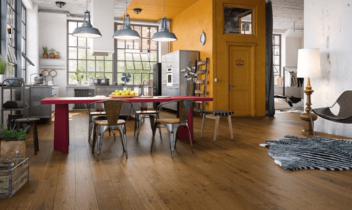 Caravan engineered European oak hardwood flooring from Outer Banks Clic collection installed in a modern room, featuring wide 6" x 9/16" planks, 2.5mm veneer layer. Canada-wide delivery available. 