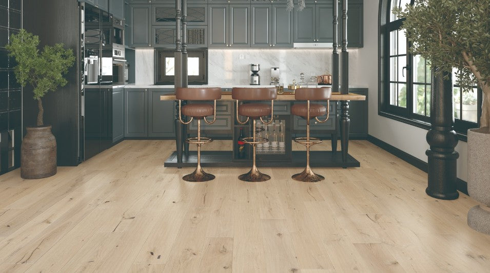 Modern interior featuring Carrara white oak engineered hardwood flooring with wide 7-1/2 inch planks in natural blonde finish from the Atelier Collection