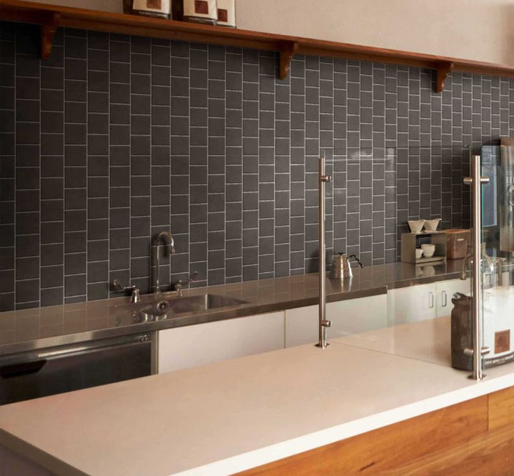 Ceratec Confetto 2x6 matte black porcelain tile flooring and backsplash – sleek and durable porcelain tiles for kitchen walls and modern interiors, from Advanced Flooring Waterloo with nationwide shipping in Canada.