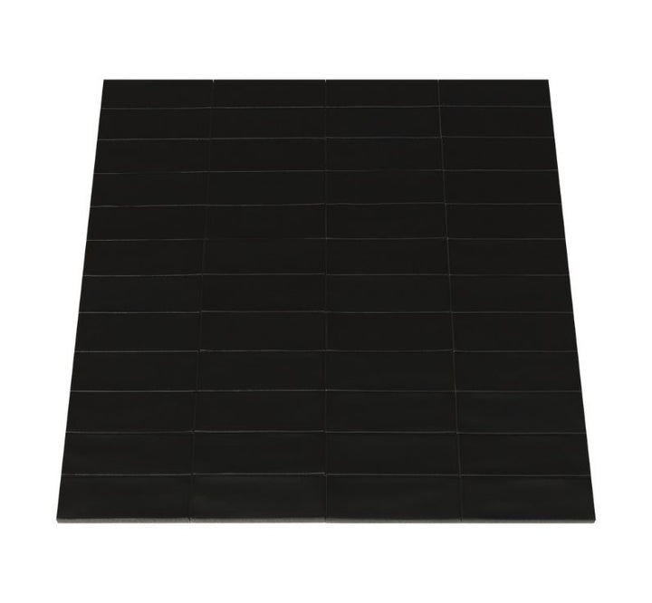 Ceratec Confetto 2x6 matte Nero black porcelain tile flooring and backsplash – sleek dark porcelain tile ideal for contemporary kitchens and bathrooms, available with tile installation in Waterloo and Kitchener from Advanced Flooring Waterloo.