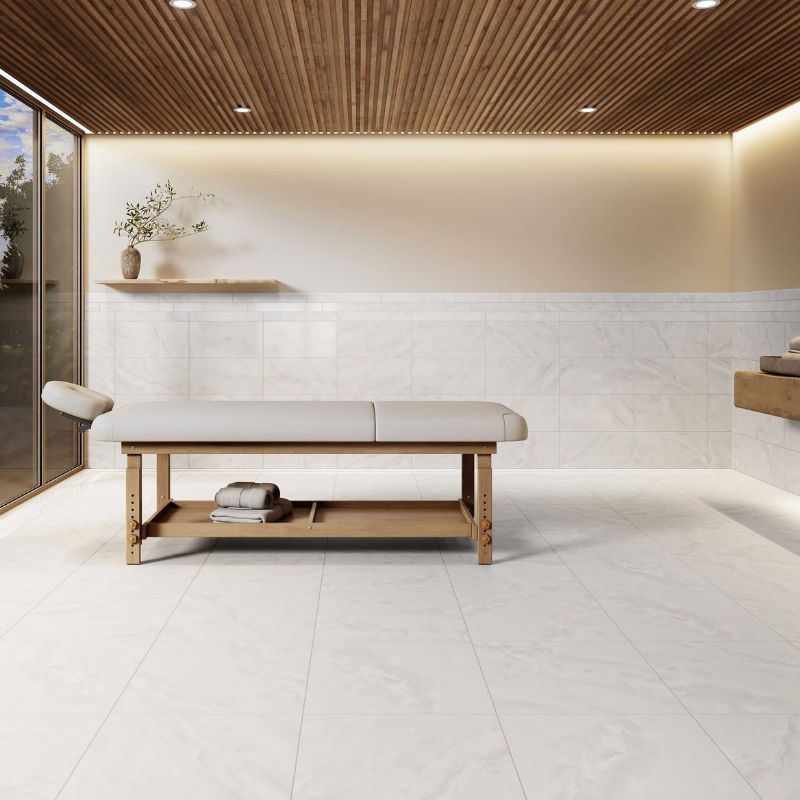 Ceratec Serena 24x24 tile flooring in a modern bathroom interior – elegant white porcelain tiles for walls and floors, available at Advanced Flooring Waterloo with Canada-wide delivery.