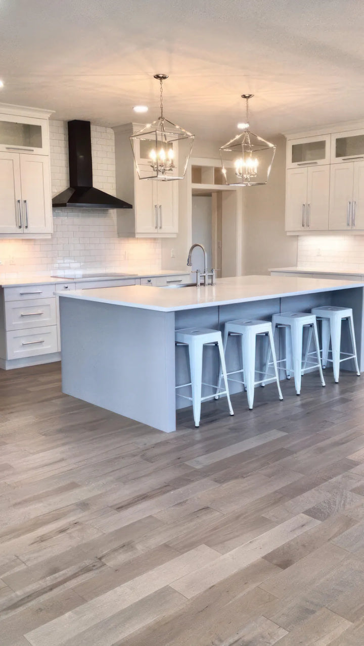 Chai Roast engineered maple hardwood flooring installed in a modern room, featuring wide 5" x 3/4" planks, 3mm - 4mm veneer layer, and natural wire-brushed finish. 