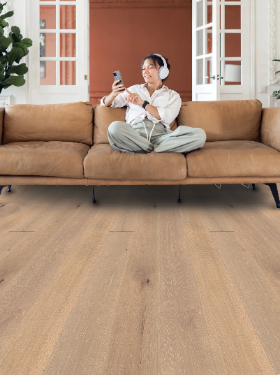 Cobblestone engineered oak hardwood flooring installed in a modern interior with wide 8 1/2 inch planks, from Fuzion’s Nouveau Renaissance Collection. Canada-wide delivery Available. 