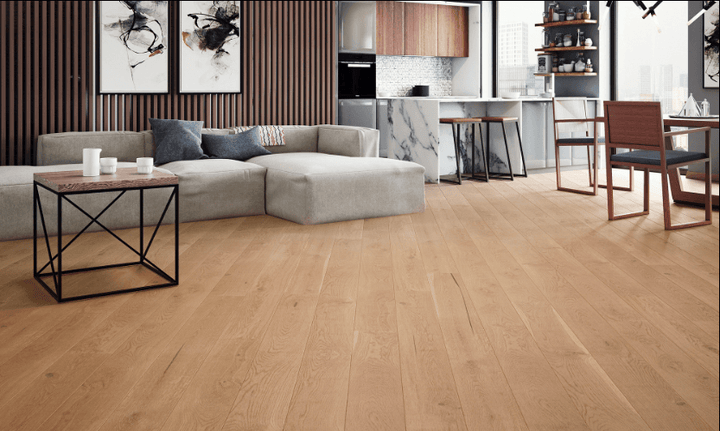 Cool Sage engineered European oak hardwood flooring from Outer Banks Clic collection installed in a modern room, featuring wide 6" x 9/16" planks, 2.5mm veneer layer. Canada-wide delivery available. 