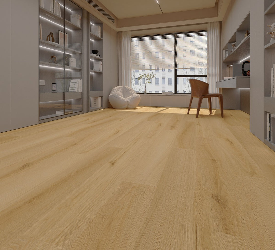 Light natural wood flooring in a modern, minimalist home office or study room with gray walls, built-in shelving, a desk, a wooden chair, and a large window.