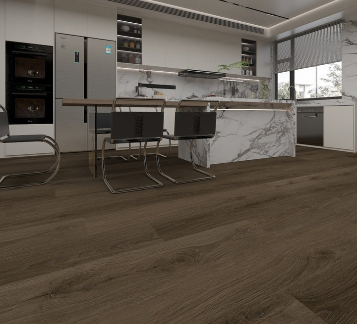 Dark brown wood-look laminate flooring shown in a modern, bright kitchen with white cabinets, a marble island, and black dining chairs.