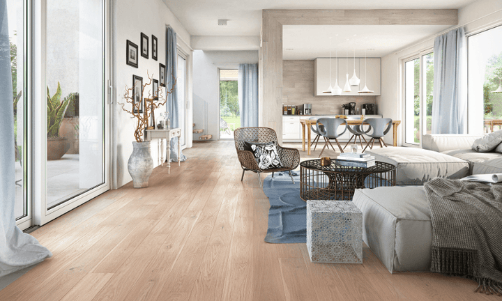 Foggy Oasis engineered European oak hardwood flooring from Outer Banks Clic collection installed in a modern room, featuring wide 6" x 9/16" planks, 2.5mm veneer layer. Canada-wide delivery available. 