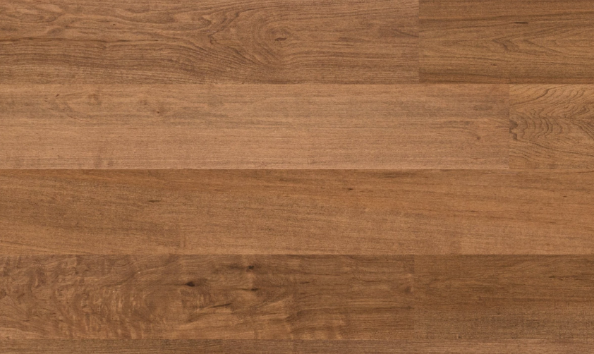 Close-up of Fusion French Roast engineered maple hardwood flooring from Bistro collection showing wire-brushed texture, T&G joint, 5" wide plank detail. Available at Advanced Flooring Waterloo. 