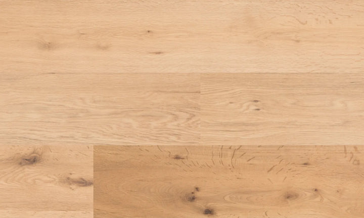 Close-up of Rubato oak engineered hardwood flooring showing wirebrushed matte texture and natural grain pattern for timeless interior design. Available at Advanced Flooring Waterloo.