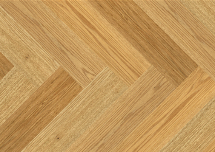 Close-up of Fusion Gentle Graze engineered oak hardwood flooring from Velvet Grove Herringbone collection showing wire-brushed texture, T&G joint, 4-3/4" wide plank detail. Available at Advanced Flooring Waterloo. 