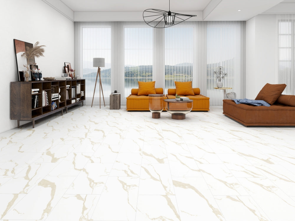 Modern living room with orange sofa, coffee table, and decorative items.