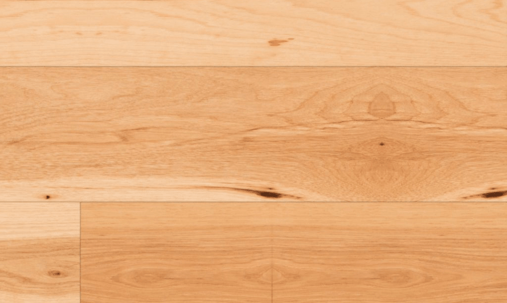 Close-up of Golden Sands engineered hickory hardwood flooring by Fuzion’s Coastline Collection, featuring a wire-brushed texture, 7 1/2" x 1/2" plank. Available at Advanced Flooring Waterloo.