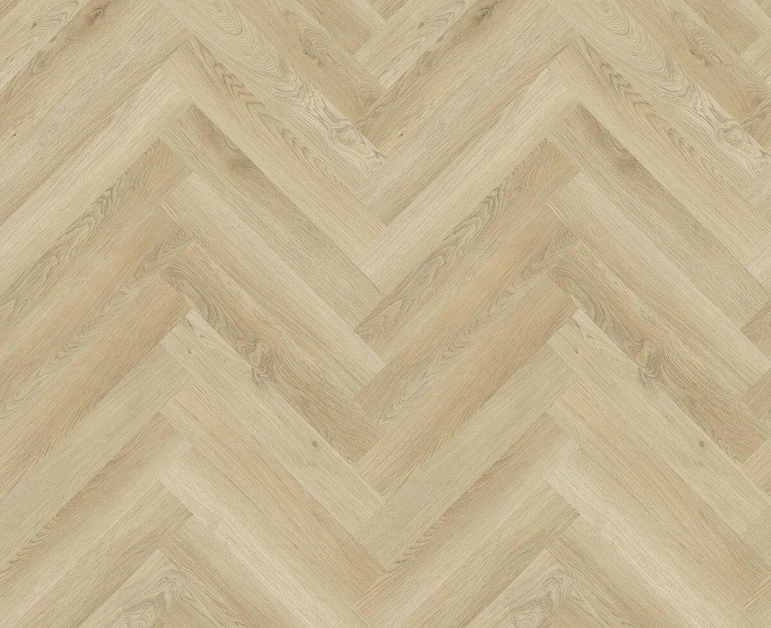 Close up of 7mm vinyl herringbone collection in the colour H04 LIGHT CHAMPAGNE by Woden Flooring sold by Advanced Flooring in Kitchener-Waterloo.