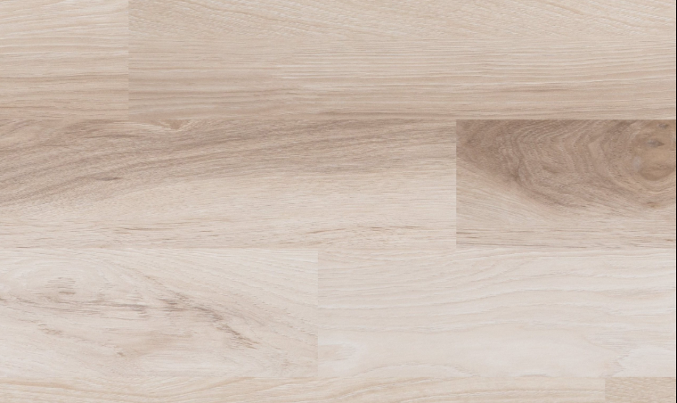 Close-up of Hoover waterproof plank flooring from Fuzion FuzGuard showing embossed wood texture and painted bevel edges.