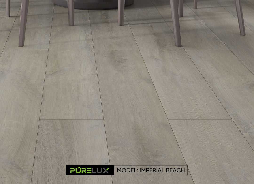 A bright and inviting kitchen showcasing the rich, gray brown tones of Purelux wide vinyl plank flooring.