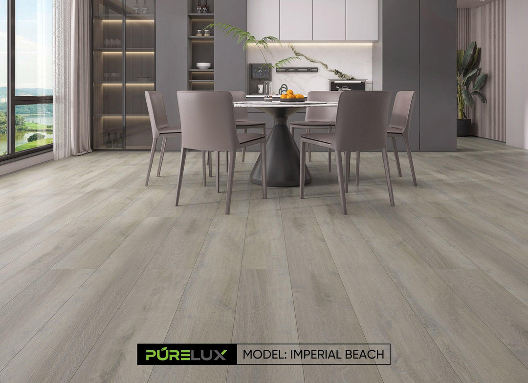 A bright and inviting kitchen showcasing the rich, gray brown tones of Purelux wide vinyl plank flooring.