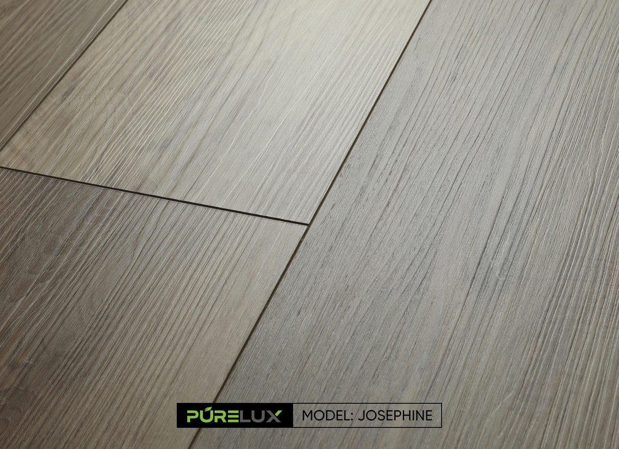 A bright and inviting living room showcasing the rich, brown tones of Purelux vinyl plank flooring.