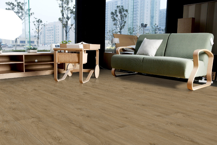 Kamloops Fuzion FuzGuard waterproof laminate flooring installed in modern living space, durable AC4 12mm planks. Available at Advanced Flooring Waterloo.