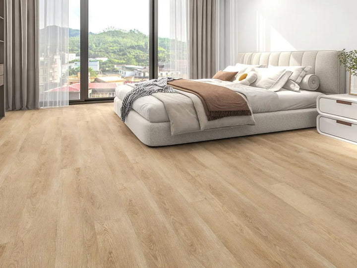 Modern bedroom with wooden flooring and large windows