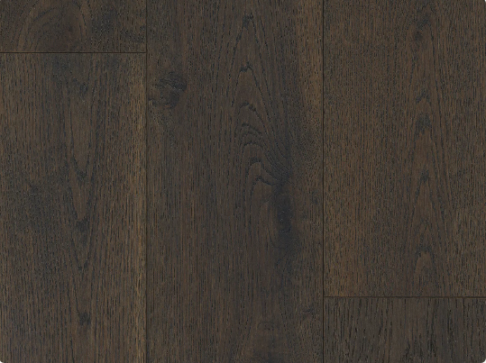 Close-up of Lighthouse Shadow engineered oak hardwood flooring by Fuzion’s Coastline Collection, featuring a wire-brushed texture, 7 1/2" x 1/2" plank. Available at Advanced Flooring Waterloo.