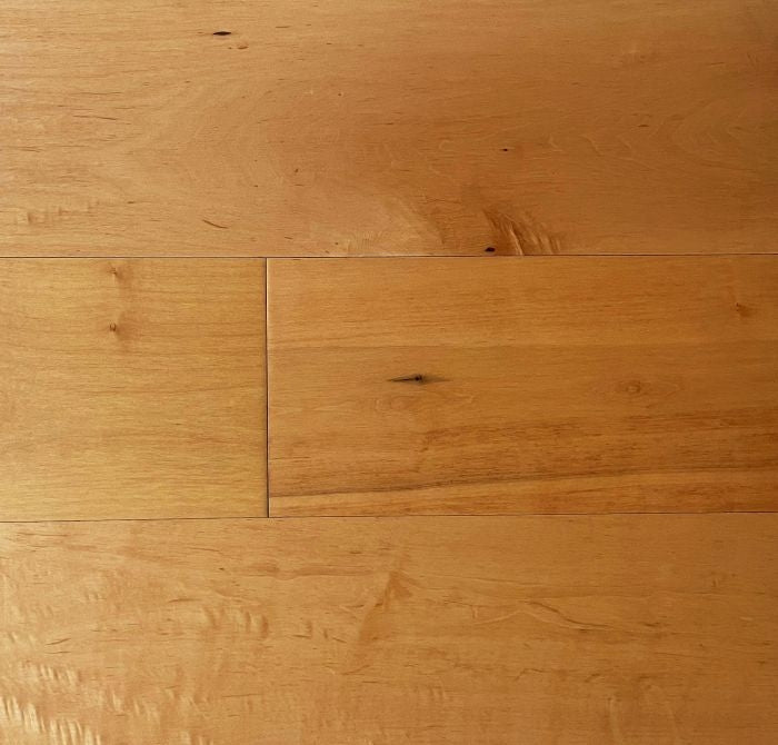 Close-up showing the texture and color of Original Maple NAF maple engineered hardwood flooring.