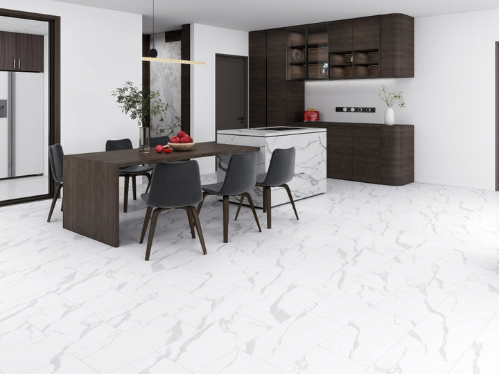 Modern kitchen with dark wood cabinets, marble island, and white tiled floor.