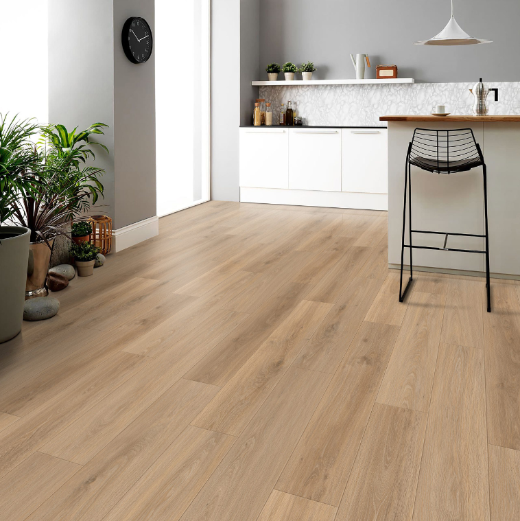 Montana Fuzion FuzGuard waterproof laminate flooring installed in modern living space, durable AC4 12mm planks. Available at Advanced Flooring Waterloo.